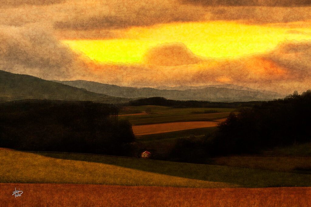 Magnificent sunset view of Patchwork Hill with red roof houses in Biei, Hokkaido, Japan