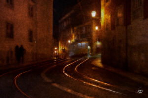 Tram28 passing through the old town of Lisbon at night, Portugal