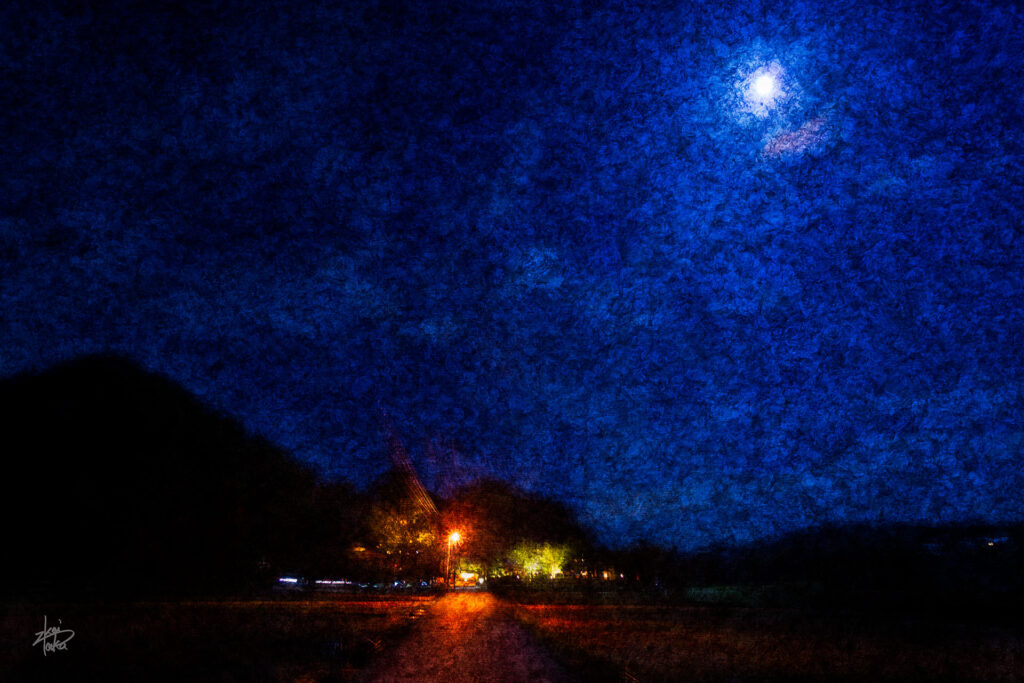 Only one Japanese inn on a moonlit night at the end of a straight road, Kanazawa, Japan