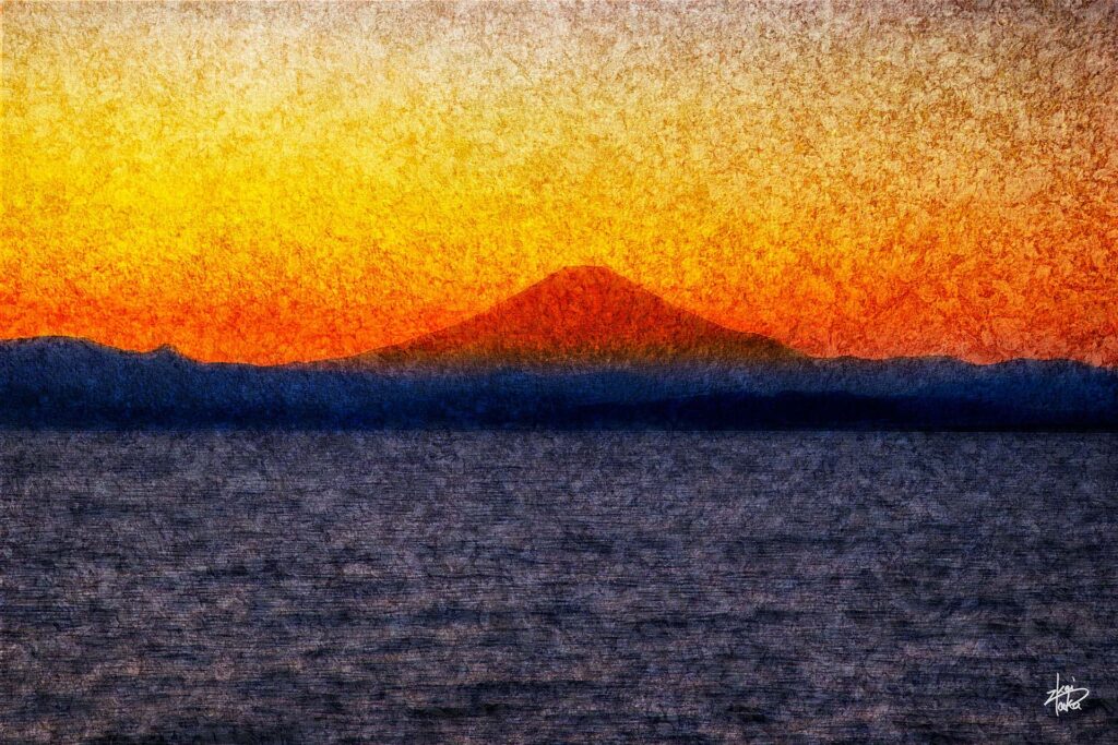 Fuji, tinted red by afterglow, seen from Enoshima, Kanagawa, Japan