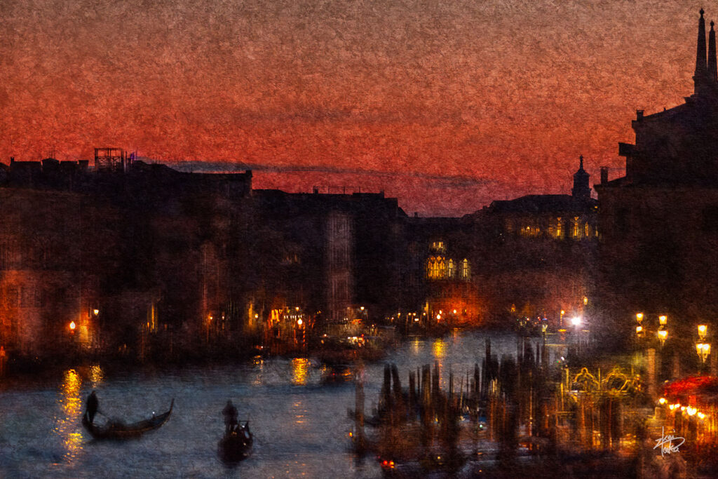 Venice sunset with gondolas coming and going