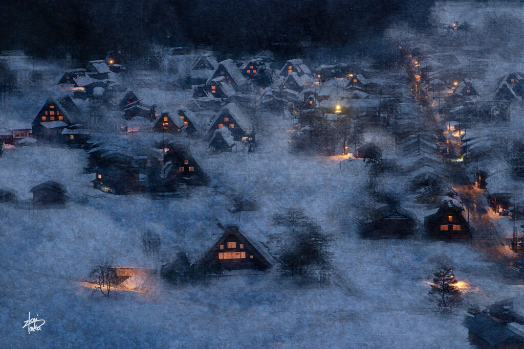 Winter illuminated night view of the historic gassho-zukuri village of Shirakawa-go, a World Heritage Site in Japan, from the observation platform.