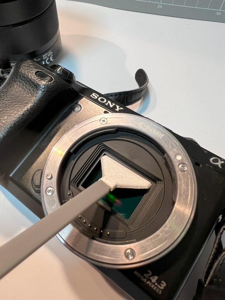 Sony Alpha series sensor cleaning with a commercial kit.