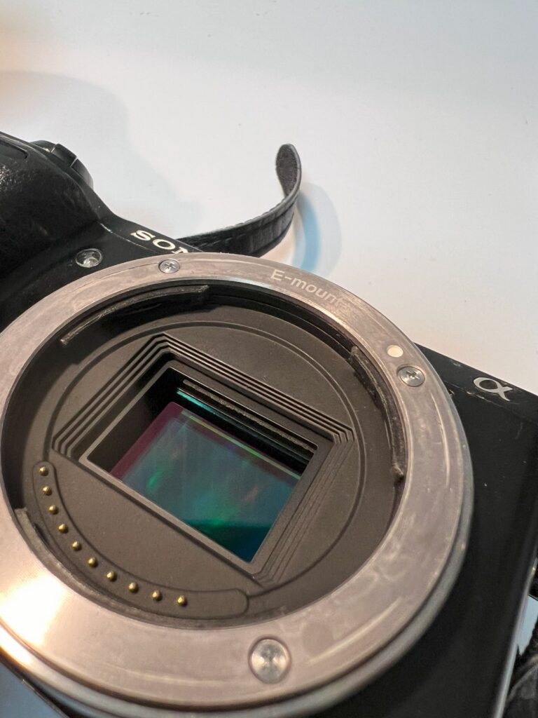 Sony Alpha series sensor cleaning with a commercial kit.