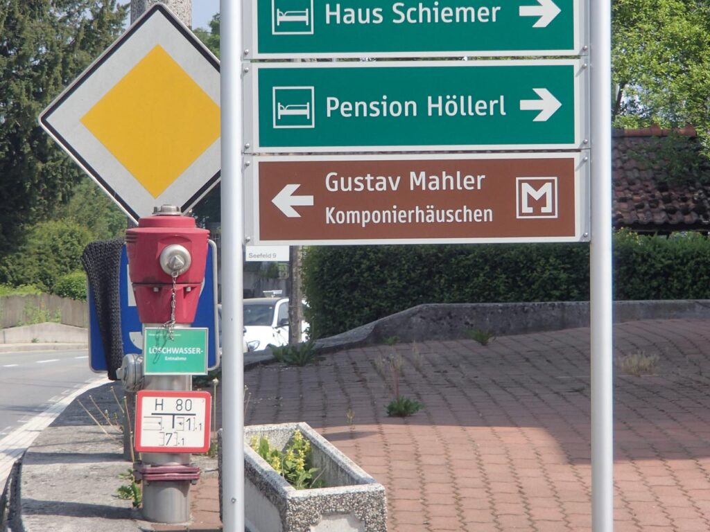 Sign across the street in front of the Föttinger Hotel